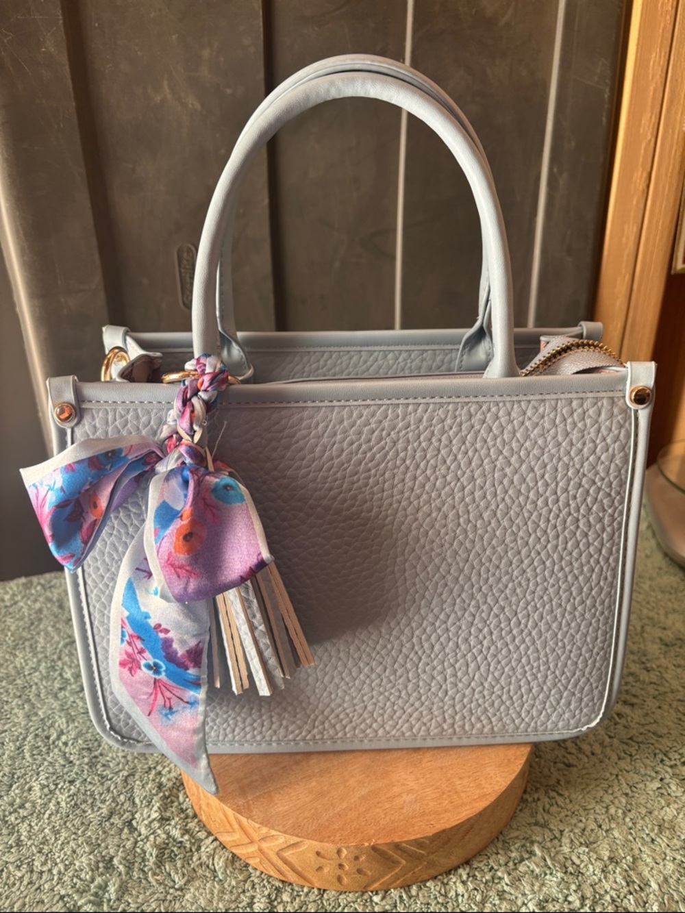 Elegant Light Gray Textured Tote with Floral Scarf Accent
